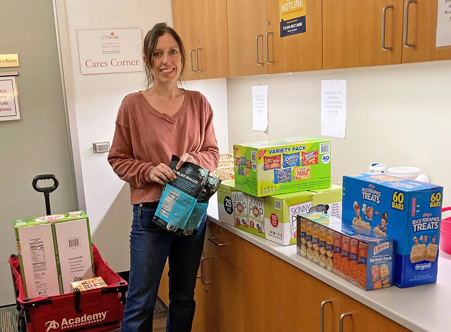 Shannon Holden delivers food and supplies to the Cares Corner.
